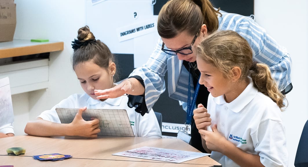 Teacher explaining to students