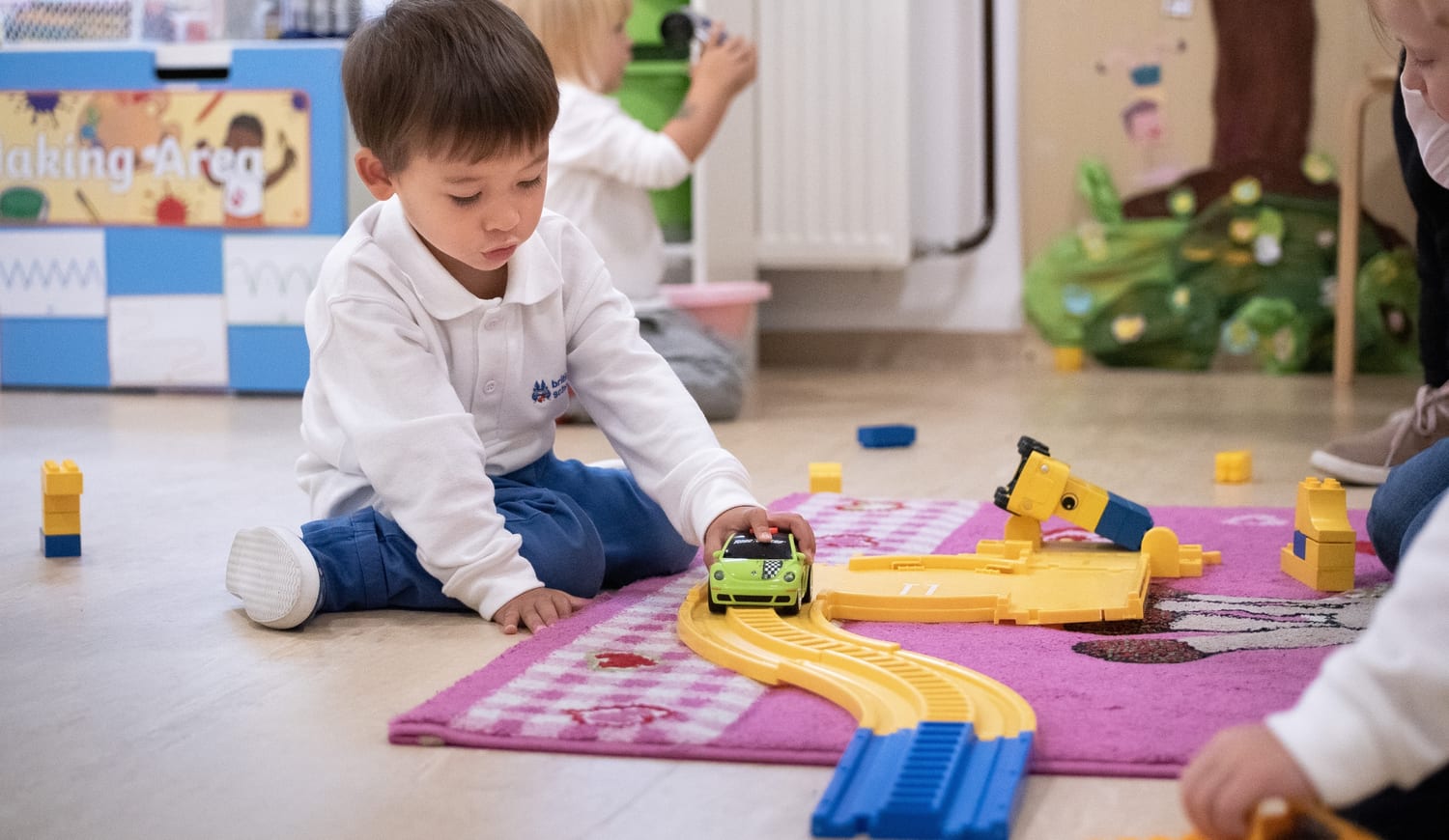 Students playing with toys