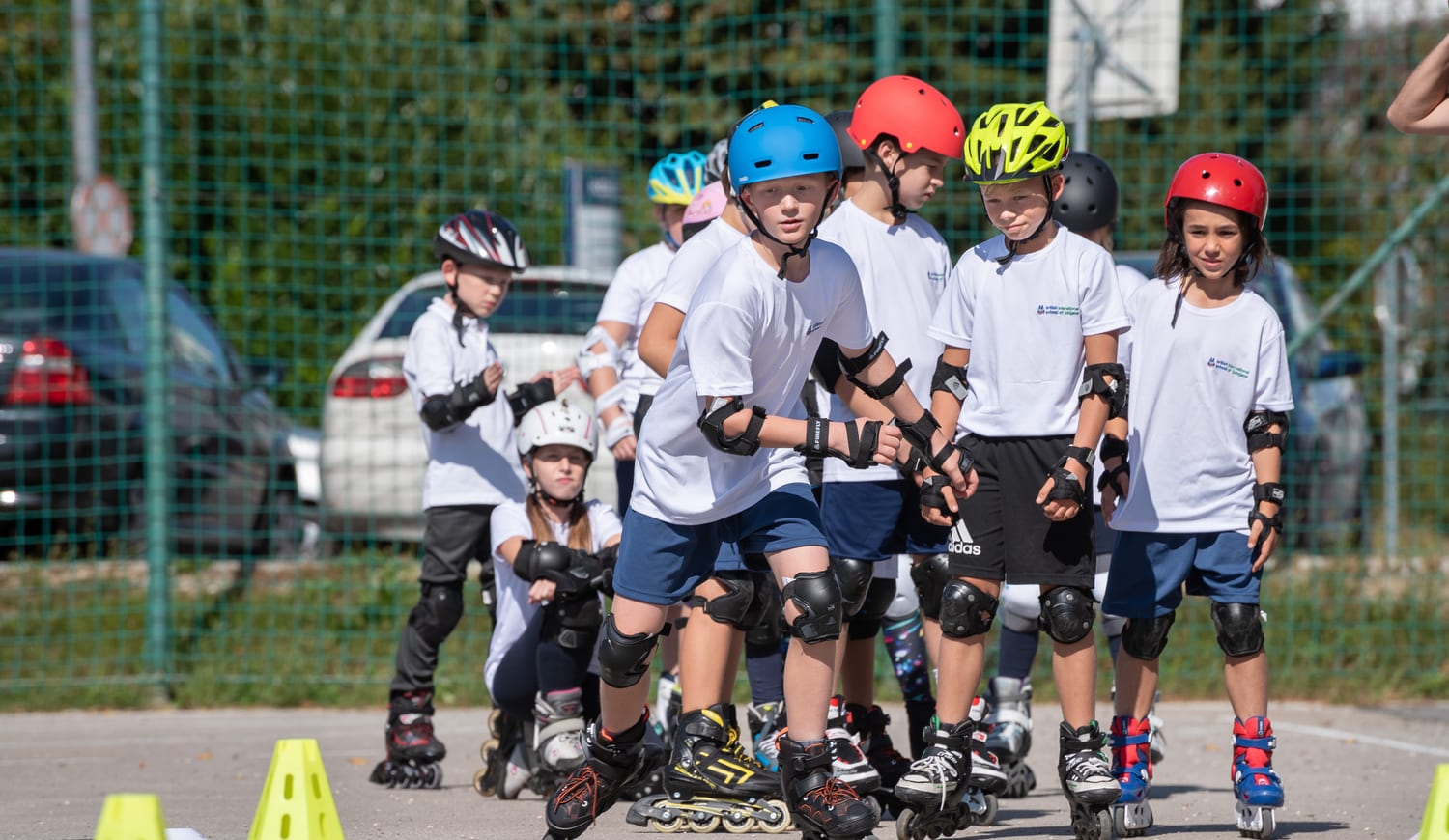 Students rollerblading outside