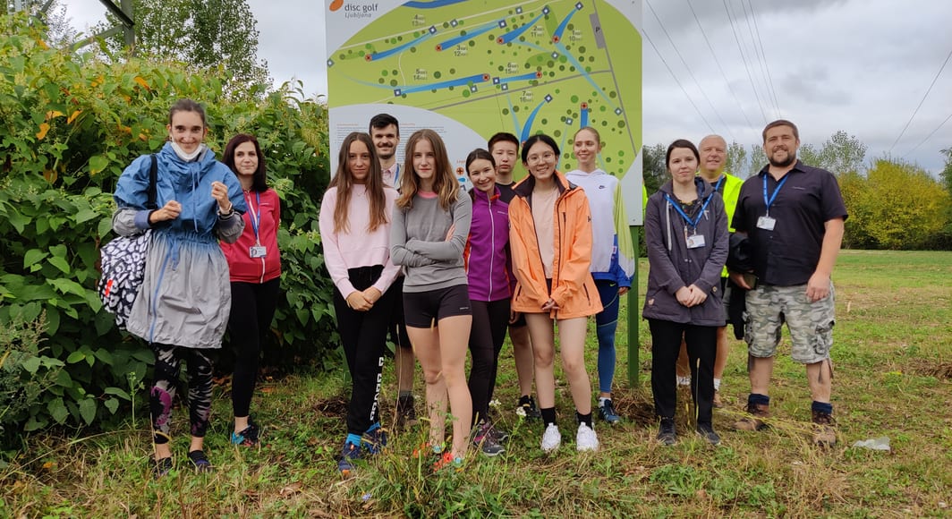 Students taking group photo in nature