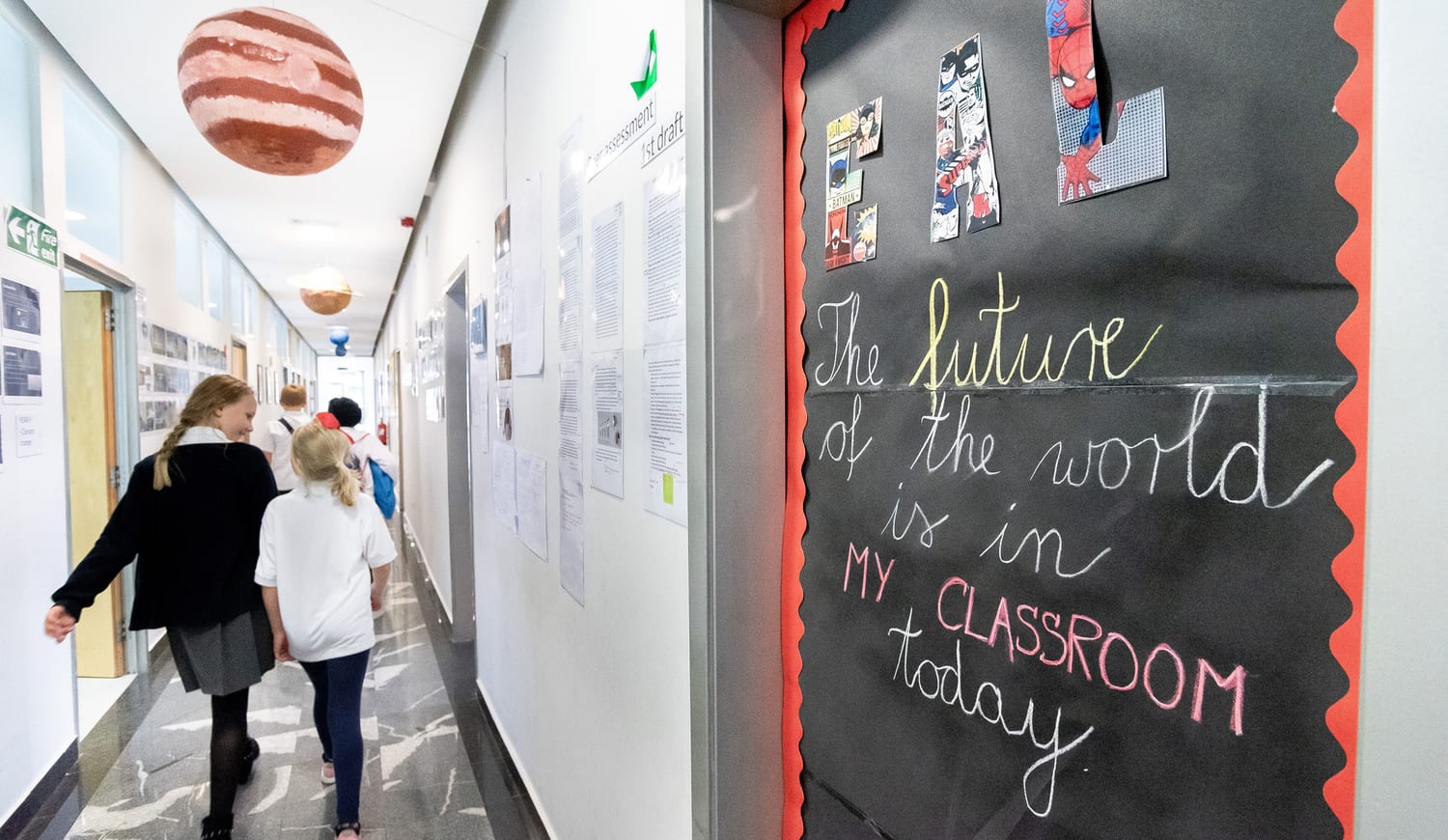 School hall with students walking