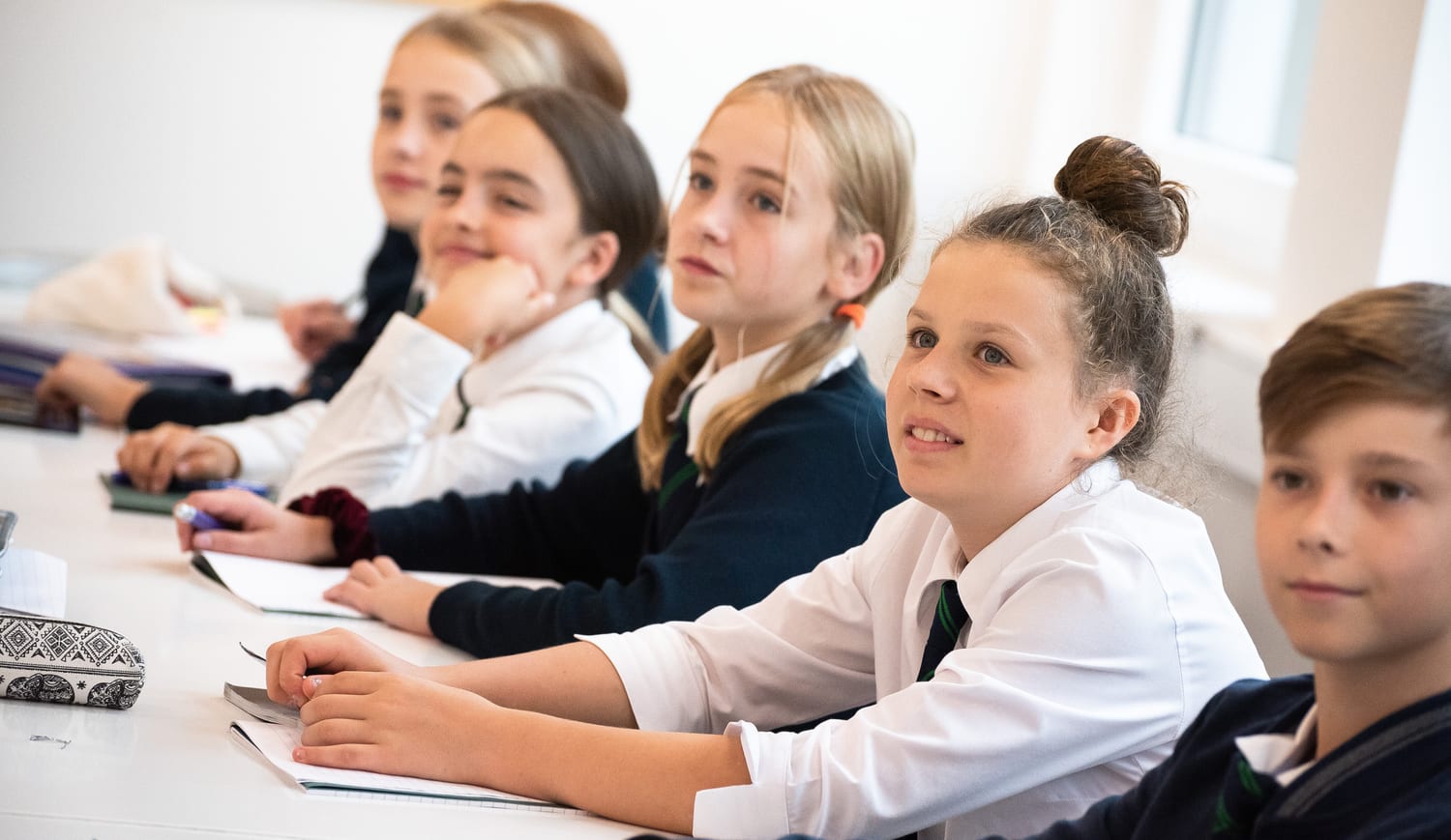Students listening in class