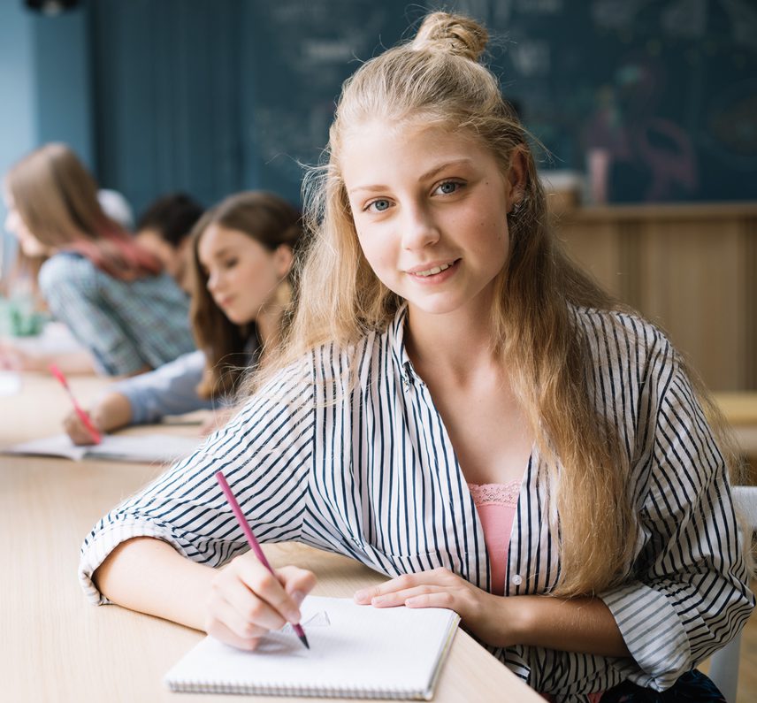 Charming student writing notepad cropped